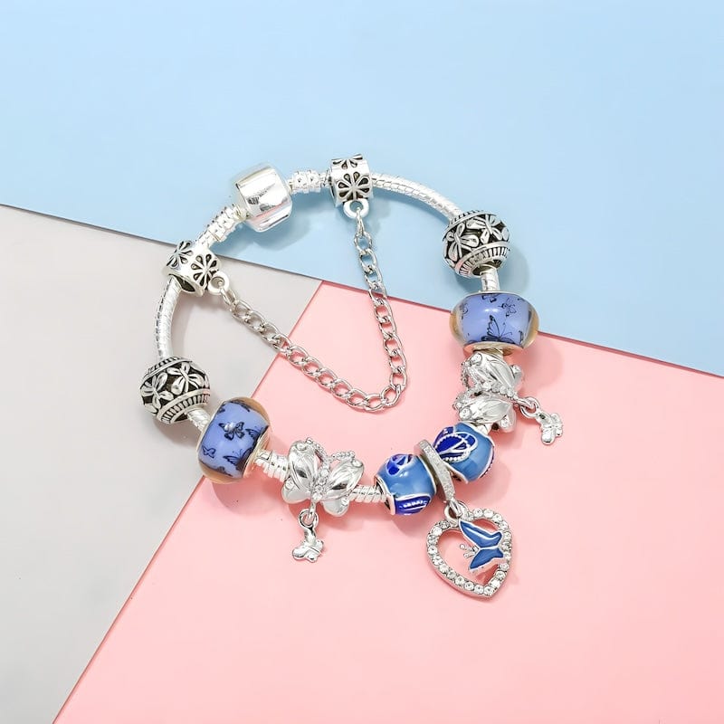 Butterfly On Heart Blue Beads Charm Bracelet bracelet by Unique Leather Bracelets