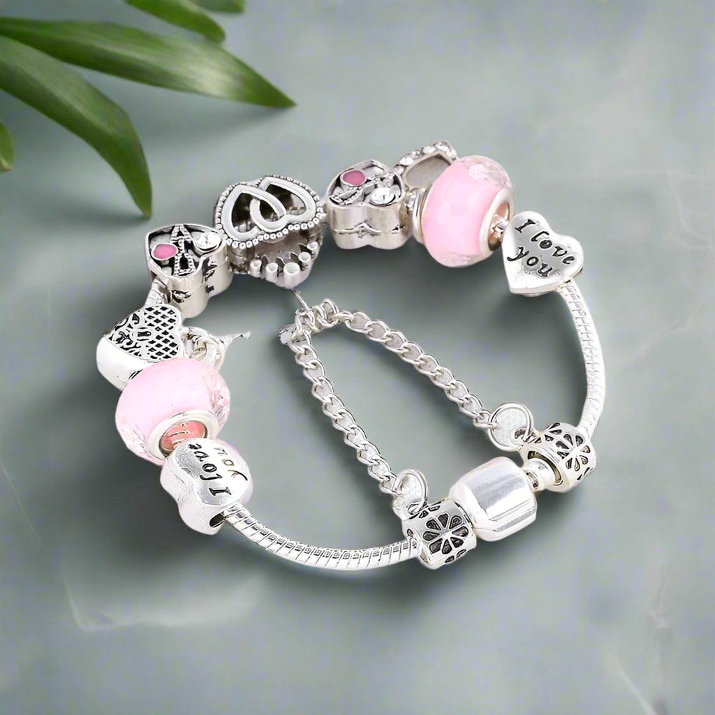Silver Charm Bracelet with Heart and Pink Beads bracelet by Unique Leather Bracelets