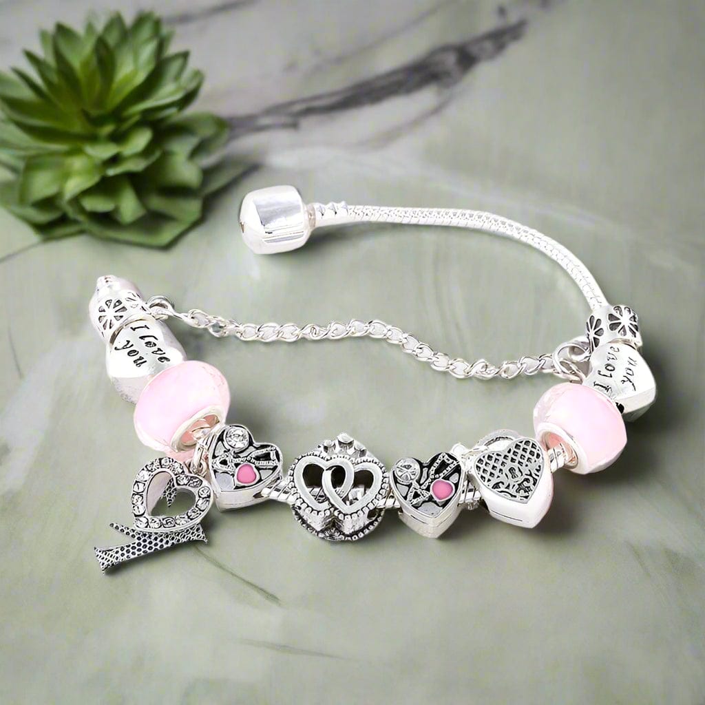 Silver Charm Bracelet with Heart and Pink Beads bracelet by Unique Leather Bracelets